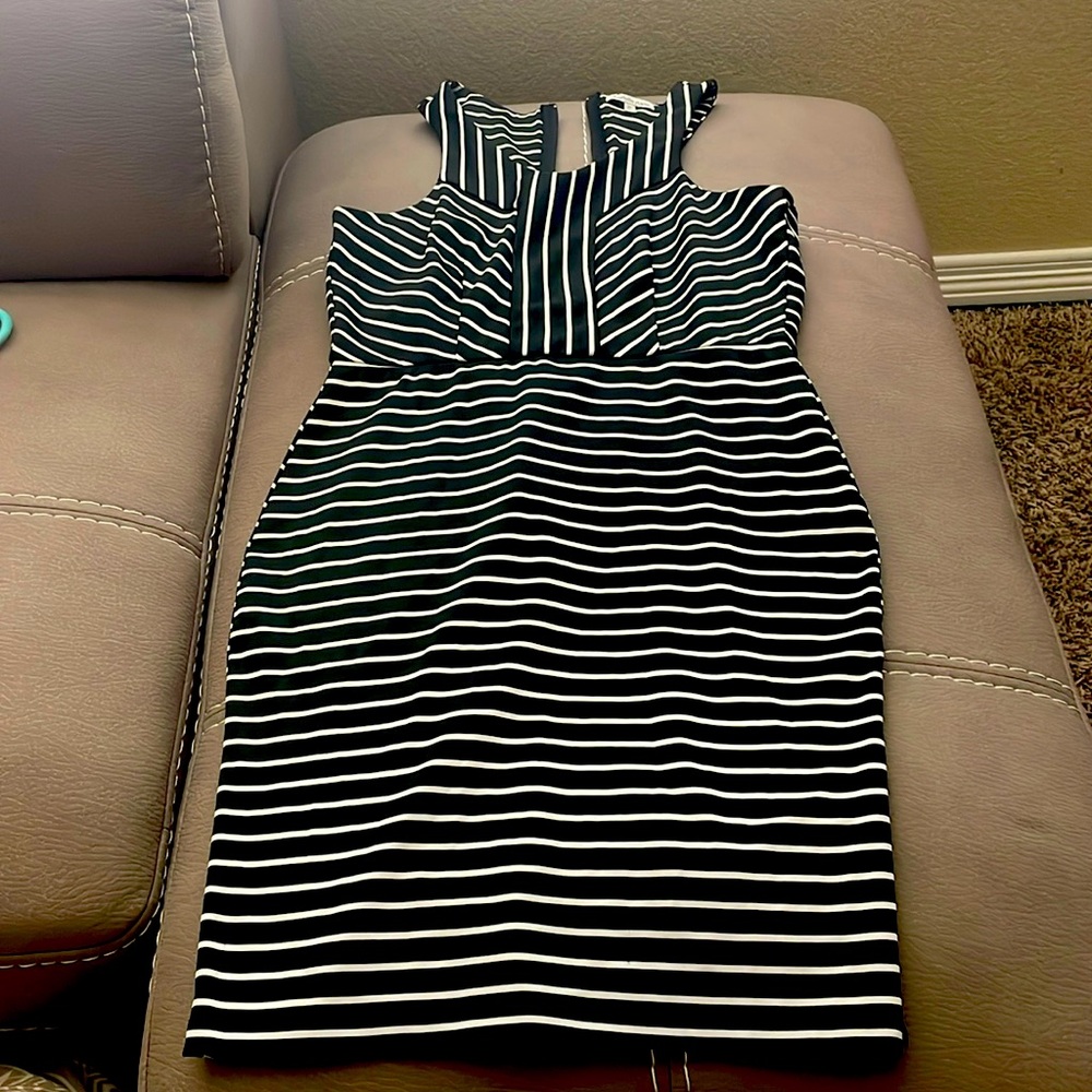 Form fitting black striped zipper back dress